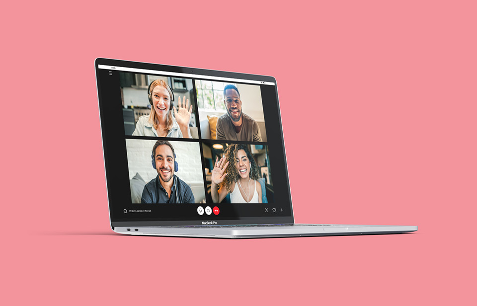 A video call with four young people on a laptop screen