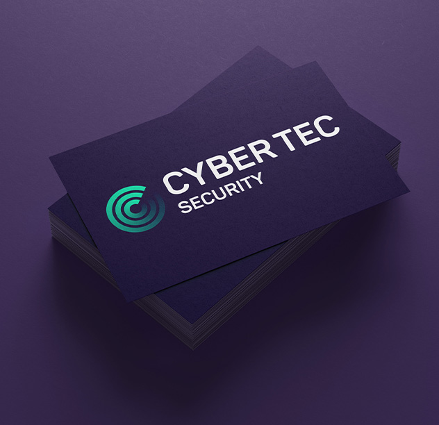 Square image of a stack of CyberTec business cards taken from a marketing branding & identity case study, with a purple background